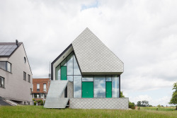 architags:  NU architectuuratelier .leeuw. Belgium. photos: Stijin Bollaert  This project concerns a new family house designed according to the passive house standard. It’s a compact home that acts as a catalyst of heat. To do this, the exterior finish