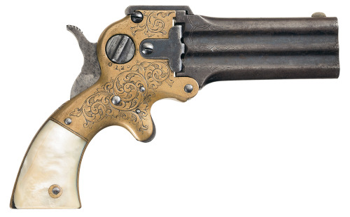 An engraved Marston three barrel derringer with pearl grips.  Made between 1864 and 1872.