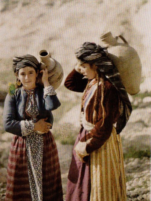 Two Kurdish girls with pitchers. Zhako, Iraq, on May 11th, 1917.This photograph was taken during Wor