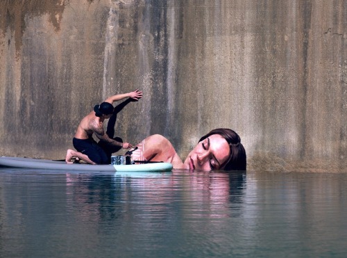SEAN YORO PAINTS HYPERREAL SEA LEVEL PORTRAITS ON HIS SURFBOARDUsing a surfboard, young Hawaiian art
