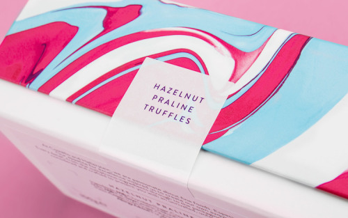 Love swirling ink on water pattern used in this another beautiful packaging design by Robot Food.