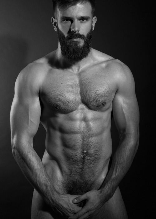 Killian Belliard is the muscled bearded man by definition