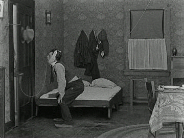 &ldquo;Big Joe&rdquo; Roberts attempts to pull Buster Keaton’s tooth in