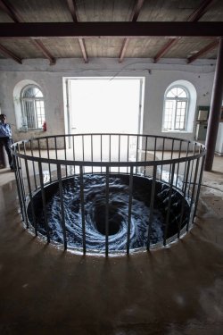 itscolossal:  A Perpetual Whirlpool of Black Water Installed in a Gallery Floor by Anish Kapoor