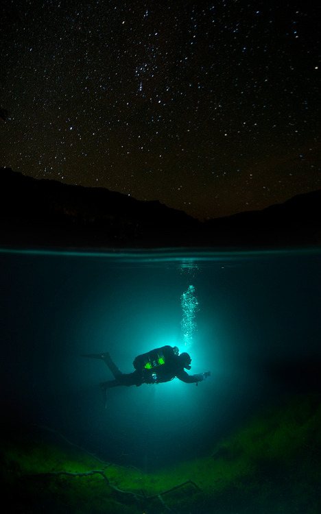 staceythinx:  Underwater photographer Viktor Lyagushkin captures divers under more than just water.  