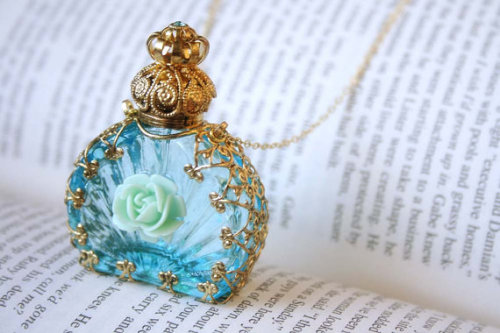 wickedclothes:Perfume Bottle NecklaceThis beautiful perfume bottle is yours to keep around your neck. Everyone will probably think you smell so good.  Sold on Etsy.