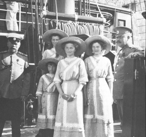 Anastasia, Maria, Olga, and Tatiana with officers on the Standart, 1913.