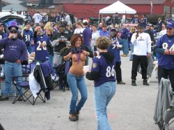 exposed-in-public:  A Football fan on Flashing Friday from http://exposed-in-public.tumblr.com/ showoffpictures:  A buddy from Baltimore sent me this one.  I bet she made her hubby proud! 