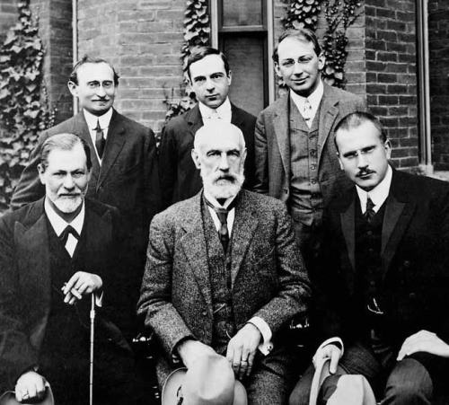 Long before their spirited epistolary rivalry, Freud (bottom left) and Jung (bottom right) used to hang out. Complement with Jung on personality and human nature and his remarkable catalog of the unconscious.
Public domain image via Wikimedia.