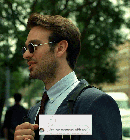 Matt Murdock in his lawyer suit smiling with image overlay with text that reads: "? I'm now obsessed with you."