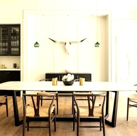 Contemporary Dining RoomEnclosed Dining Room Idea With A Large, Modern, Medium-tone Wood Floor And A