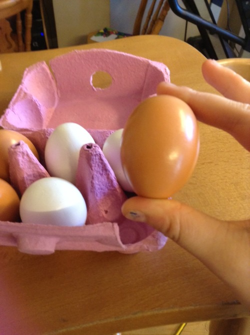 Someone replaced all the eggs in the fridge with wooden eggs….