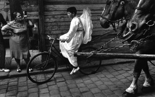 fewthistle: Angel on a bicycle. Prague. 1968. Photographer: Josef Koudelka