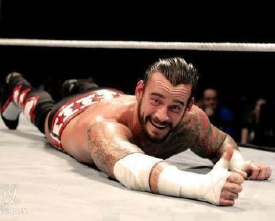 coolstoth:  CM Punk thinking his done a great job/ or just Smiling for the camera.