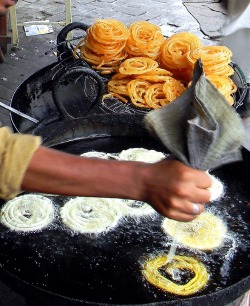 pakistan365:  A vendor prepares Jalebi’s for Iftar.