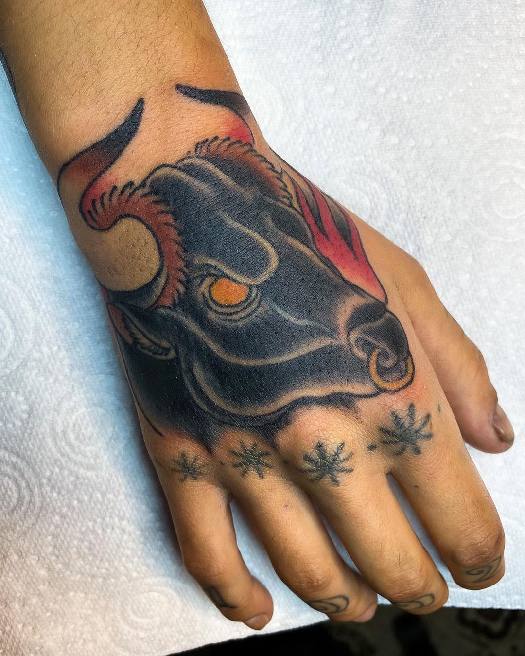 Tiny Bull Skull Tattoo on Finger by Ben Licata TattooNOW