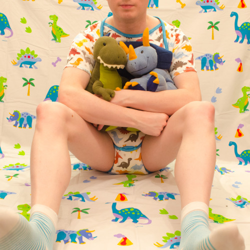 xorcub:  Um, I don’t know… Dinomania! I know I should get some dino socks too. Wander what other dino stuff I could find? (Onsie from JayKayBaby) 