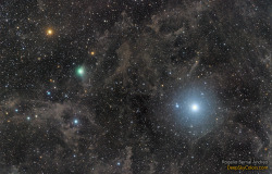 just&ndash;space:  Polaris and Comet Lovejoy    : One of these two bright sky objects is moving. On the right is the famous star Polaris. Although only the 45th brightest star in the sky, Polaris is famous for appearing stationary. Once you find it, it