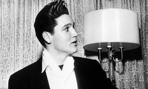 vinceveretts:  Elvis in his hotelroom in Miami, March 22, 1960. 