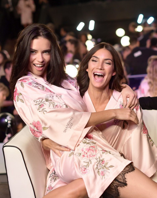Lily Aldridge and Adriana Lima pose backstage at the 2017 Victoria&rsquo;s Secret Fashion Show o