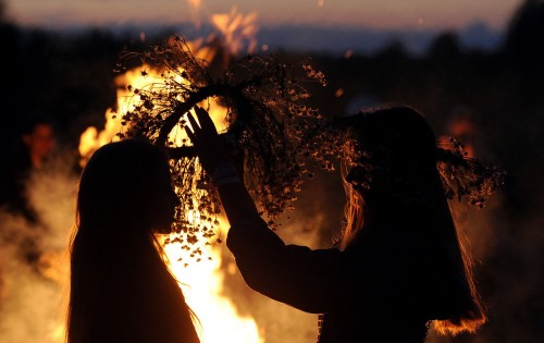 alraunahomestead:1. Two girls don traditional wreaths near a bonfire during Ivan Kupala Night celebr