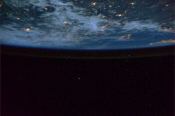 colchrishadfield:  People ask to see stars - my camera does its best in dim light. Our atmosphere glows in the dark. 