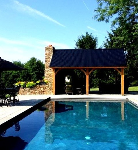 Patio - Gazebos Example Of A Mid-sized Mountain Style Backyard Concrete Paver Patio Design With A Fire