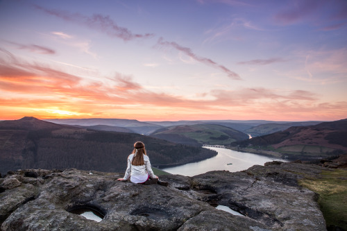 My daughter on Bamford Edge in the Peak District. The reservoir in the distance is Ladybower.