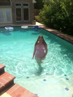 alexinspankingland:  Swimming in my friends’ pool in my undershirt and panties. (2013) 