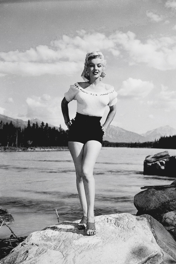 ourmarilynmonroe:  Marilyn Monroe photographed on the set of River of No Return in