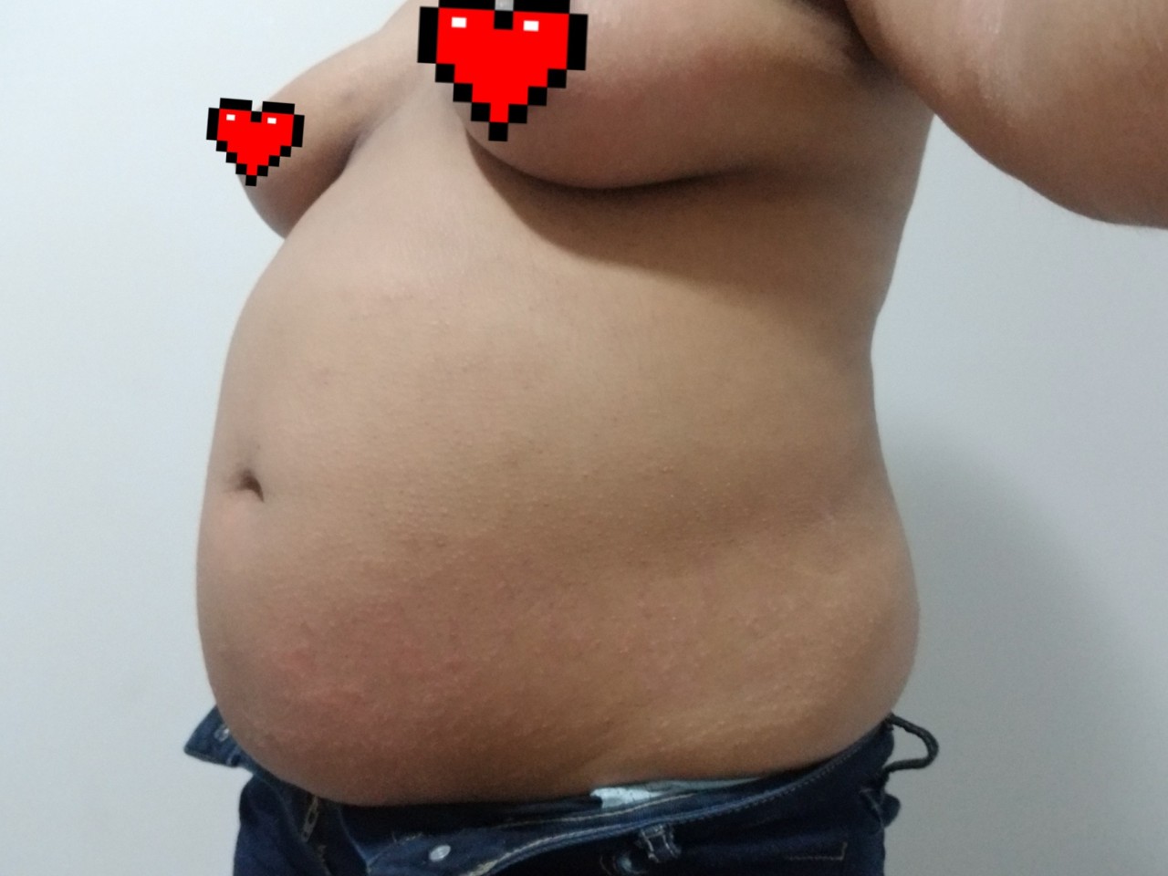 ohbelly:I can’t stop getting fatter. I’m trying to slow it down because all of my clothes are getting tight. my belly is poking out the bottom of most of my shirts, when I’m full and sit down. I can’t fit into any of my jeans and