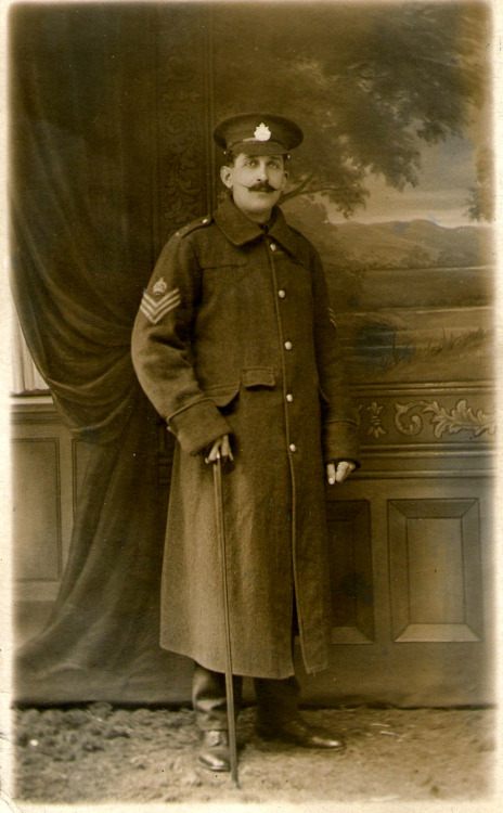 real photo with postcard back of a soldier in uniformc1910