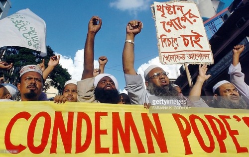 speciesbarocus:Members of the ’Bangladesh Khilafat Andolan’ Party chant slogans against Pope Benedic