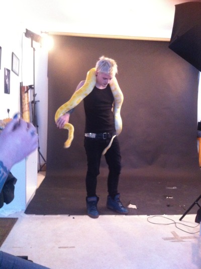 Jake with the snake that matched his hair.:P The smaller of the burms, can’t wait to see pictures with the huge one.