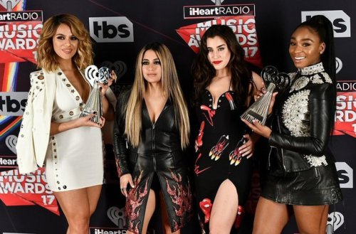 Fifth Harmony accepting the Taco Bell #BestFanArmy and Best Cover at the iHeart Awards.