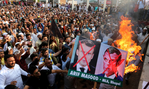 Protesters took to the streets in Bhopal, India, after Macron criticised Islamists and vowed not to 