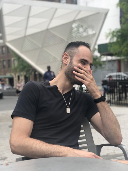 tj-593:  My friend took these photos of me cracking up in real time as he was making a joke about hot leather daddies as a couple of leather daddies passed by our table in the park. Also, look how horrible of a job portrait mode did here.