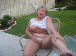 This Heavyset Older Lady Is Showing Us Her Pussy. Bet She Would Be One Smooth Ride