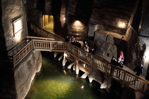 placesandpalaces: Wieliczka salt mine, Poland In southern Poland, Lake Wessel lies inky and unmoving in the deep. Filling the bottom of an old salt mine, it’s just one component of the UNESCO World Heritage Site which has been a functioning mine since