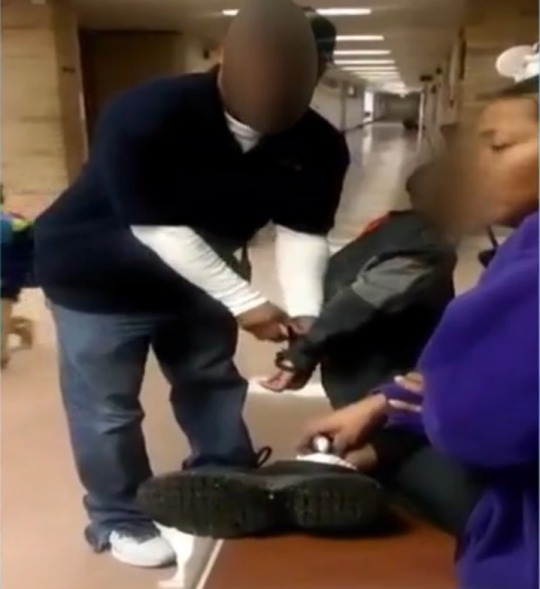 XXX Police  Handcuff 7-Year-Old Student in Flint photo