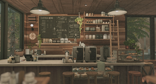 The Otterhouse A Quaint Coffee Shop, Right On The Road. With Big Modern Windows And A Rustic Interior,