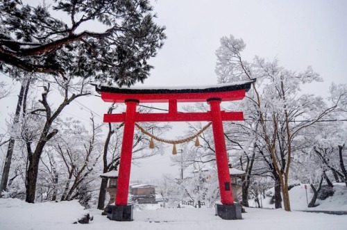 A red torii stands out among the snow in Takayama, a town in the Japanese Alps. You can read more ab