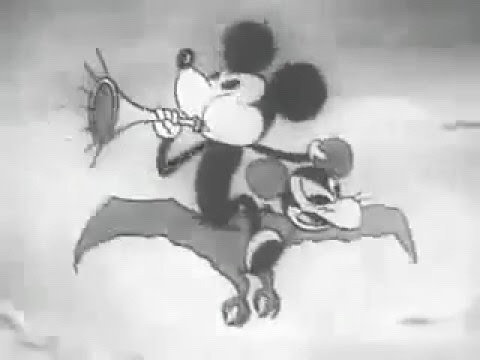 talesfromweirdland:A bizarro Mickey attacks Japan in this Japanese propaganda cartoon from the 1930s