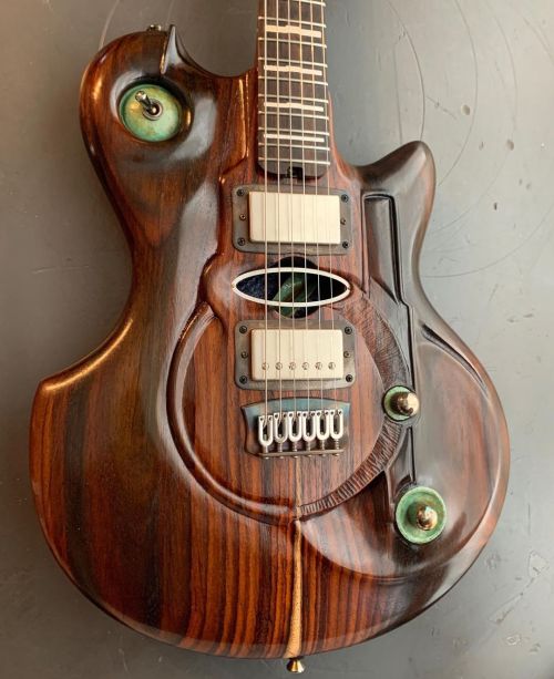 Hand carved rosewood body with copper and steel accents. I make M-tone guitars. Thanks! #handmadegui