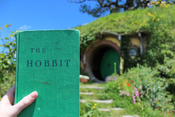 quincykate:   so i went to hobbiton and took a picture of my fifty year old copy of the book. no big deal. i mean, it’s in front of bag end, but no big deal. 