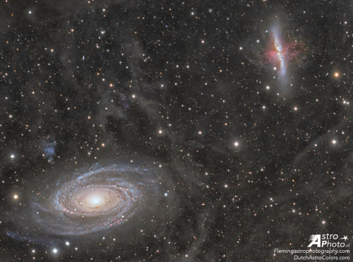 just–space:  Galaxy Wars: M81 versus M82   : In the lower left corner, surrounded by blue spiral arms, is spiral galaxy M81. In the upper right corner, marked by red gas and dust clouds, is irregular galaxy M82. This stunning vista shows these two