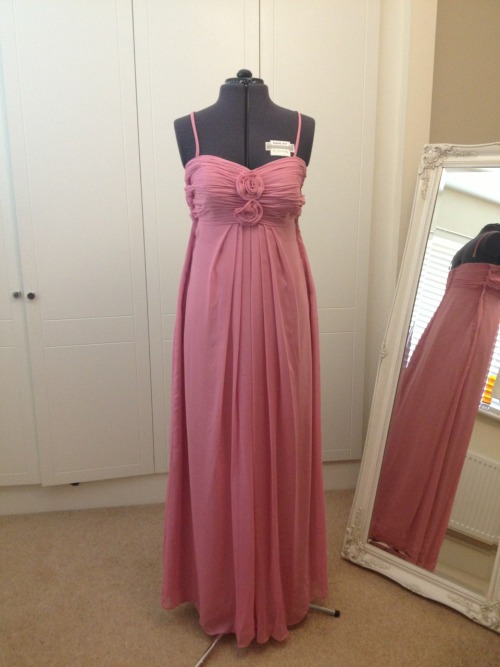 Transformation of a cherished bridesmaids dress into a cute sun dress! We altered the size of the go