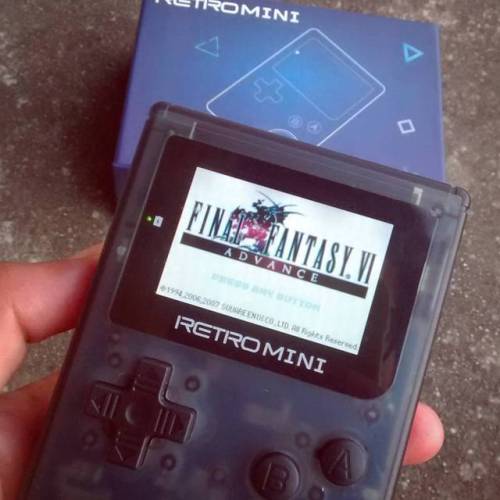 welcometomomuniverse:  2000ish:  spookygrowly:   shutupandtakemymonies:    The Retromini (Retro mini) is a handheld console which can play GB, GBC, GBA and NES Games. At only 103. grams with the battery, it is lightweight and extremely portable.   It