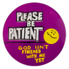 a purple pin with white text that reads 'PLEASE BE PATIENT', and yellow text that reads 'GOD ISN'T FINISHED WITH ME YET'