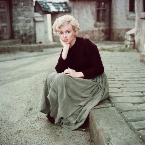 perfectlymarilynmonroe:Marilyn Monroe photographed in the “Peasant Sitting” by Milton H. Greene in May, 1954. This shoot was done on the Twentieth Century Fox backlot on the French village set of What Price Glory. Marilyn is wearing the costume Jennifer